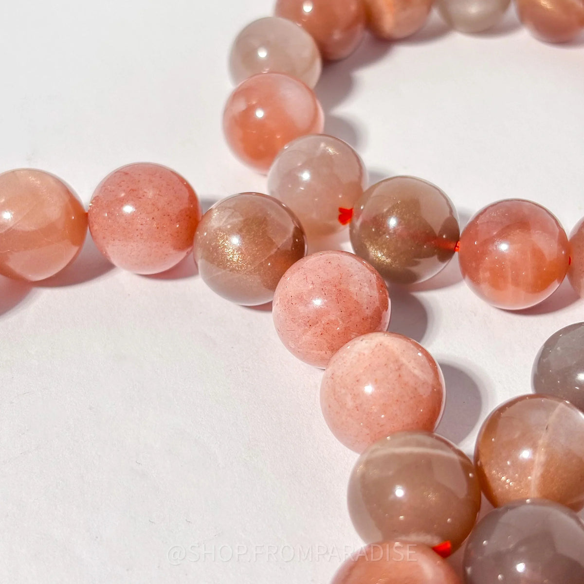 Peach and Black Moonstone Round Bead Crystal Bracelet