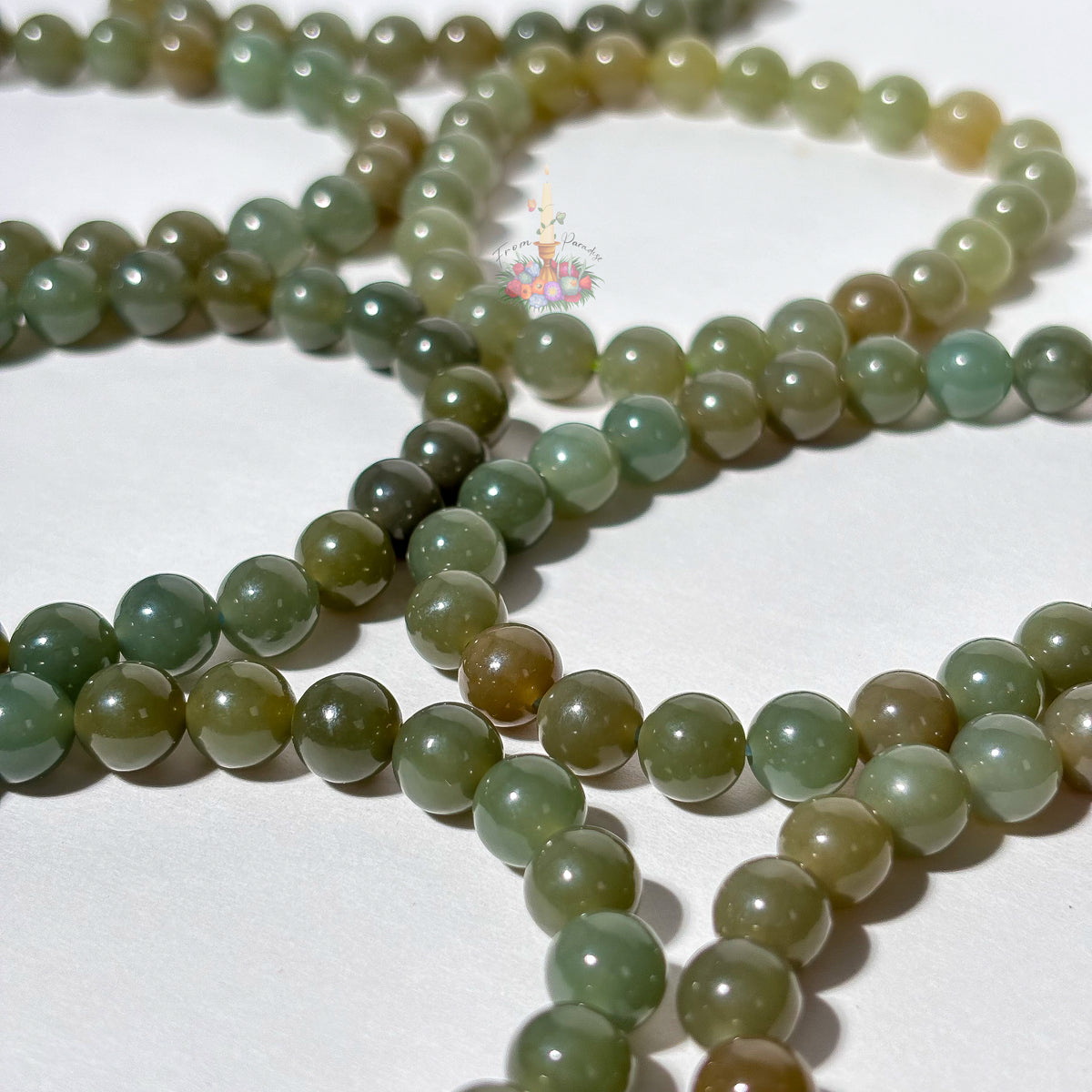 Natural green nephrite jade bead bracelet for abundance and good fortune.