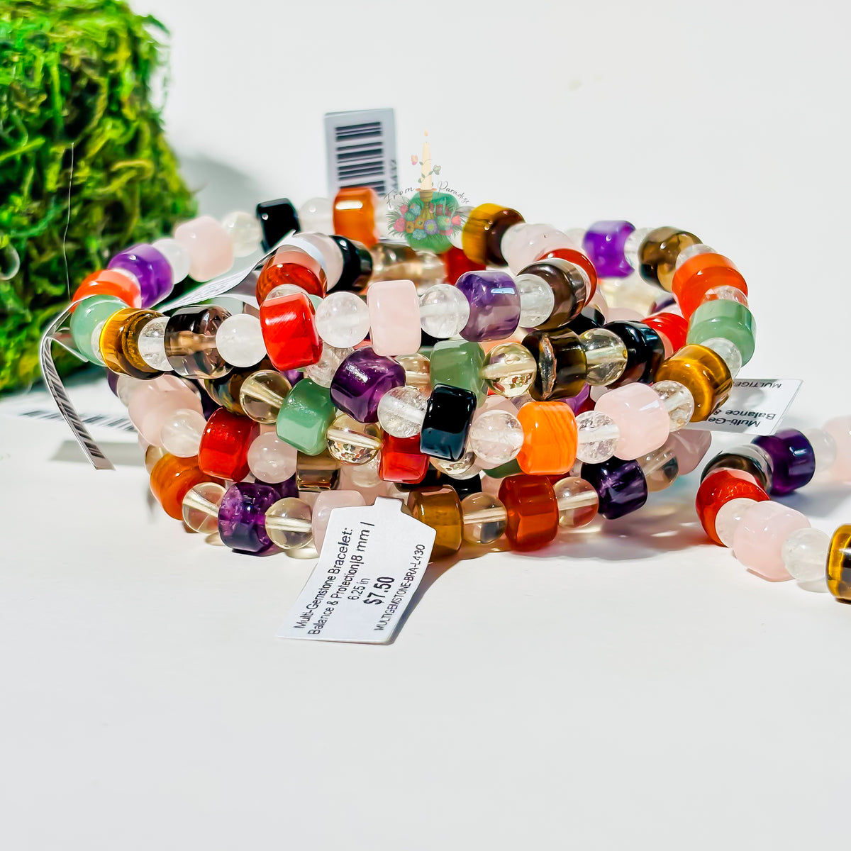 Multi-gemstone crystal bracelet with colorful healing stones for balance and protection.