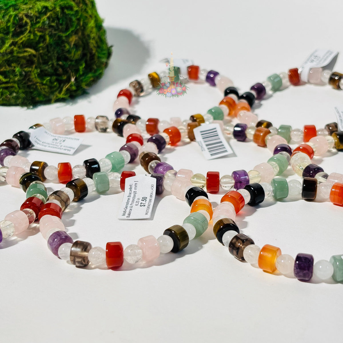 Multi-gemstone crystal bracelet with colorful healing stones for balance and protection.