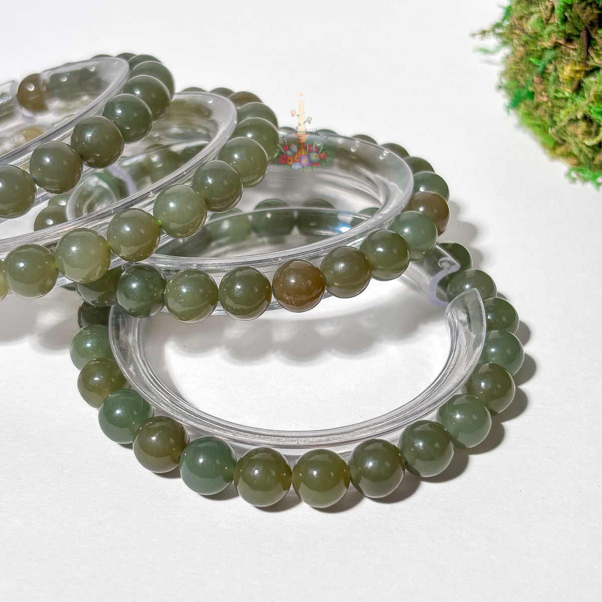 Natural green nephrite jade bead bracelets for good fortune and abundance.