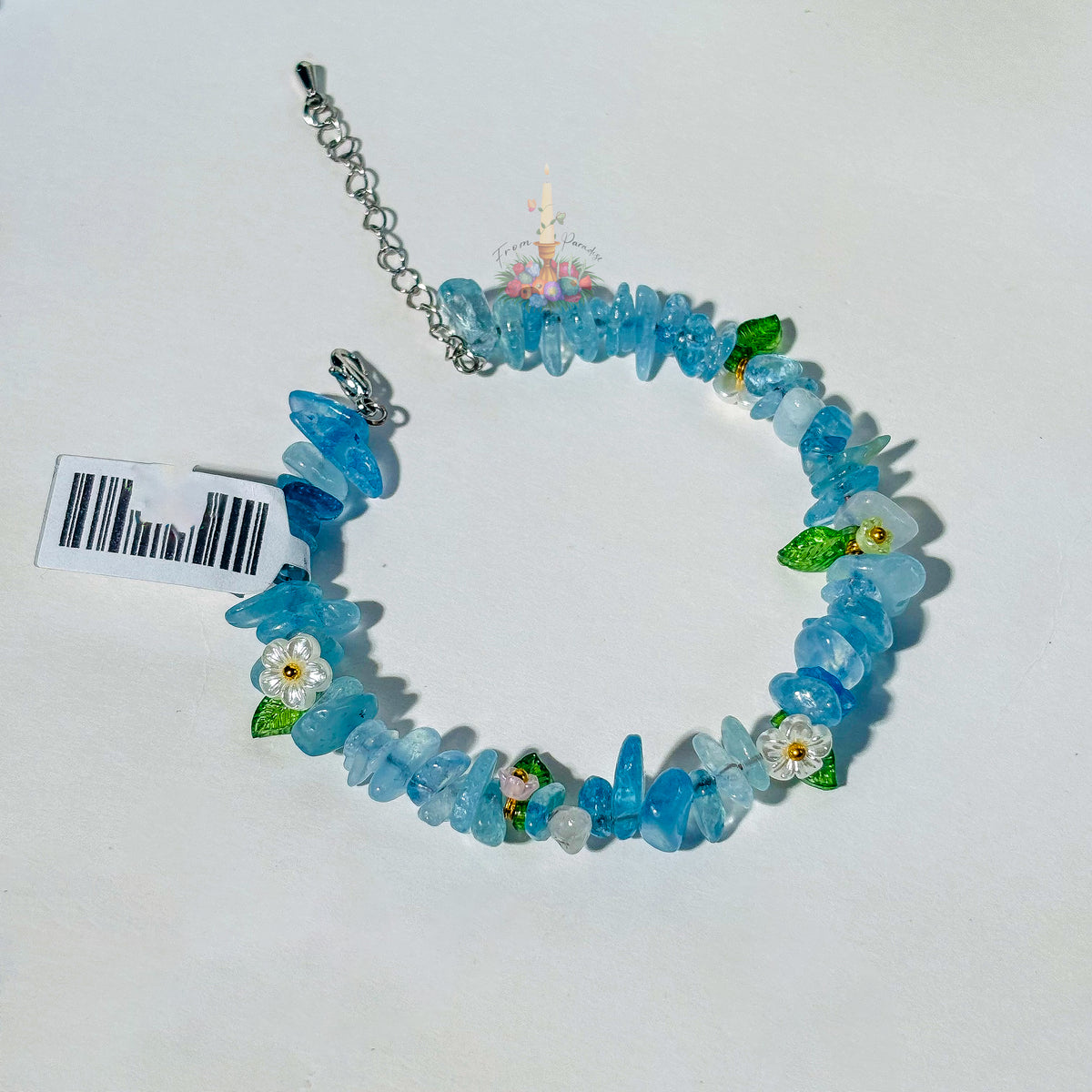 Aquamarine Flower Fairy Crystal Bracelet by From Paradise with blue beads and floral accents