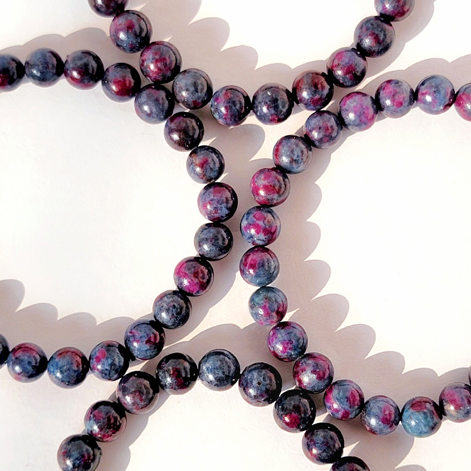Ruby in Kyanite Round Bead Crystal Stretch Bracelet
