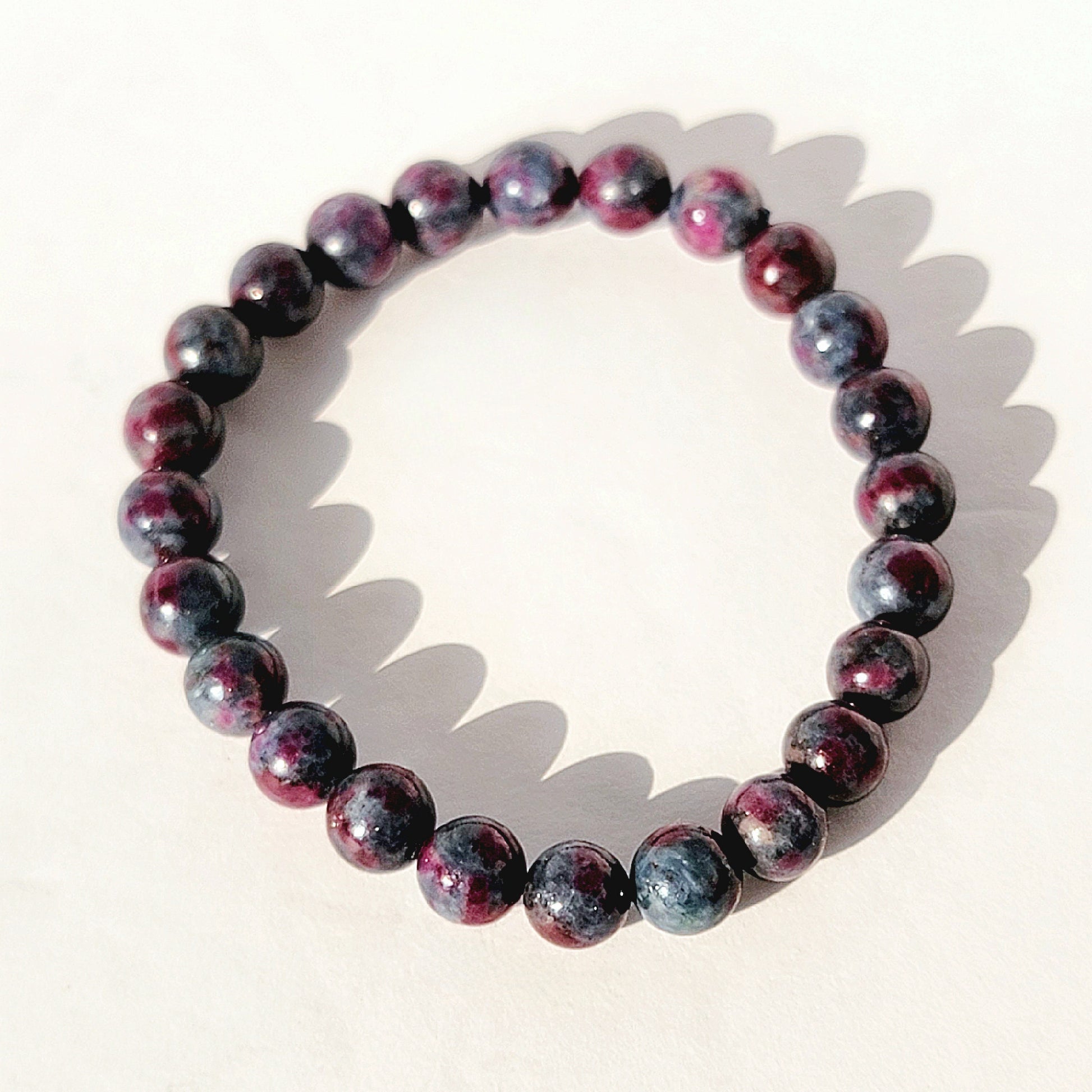 Ruby in Kyanite Round Bead Crystal Stretch Bracelet
