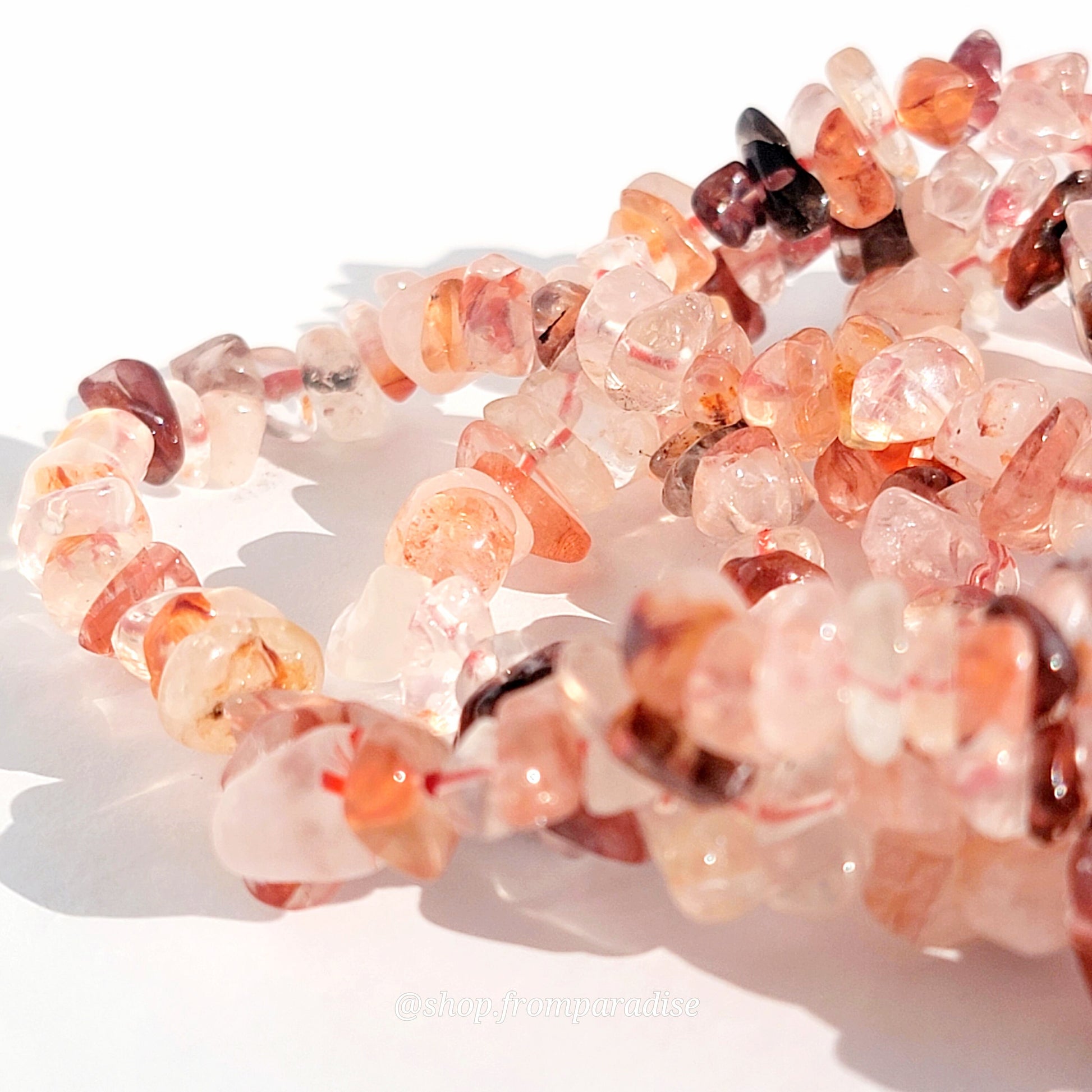 fire quartz crystal chip stretch bracelet jewelry displayed against a white background