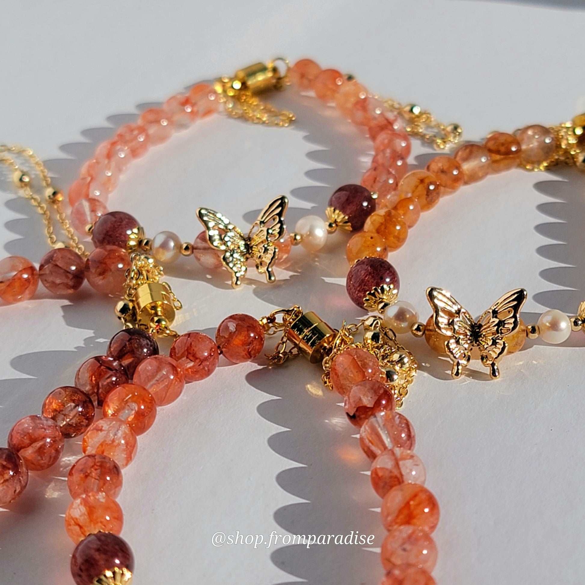 Fire Quartz and Strawberry Quartz Butterfly Charm Magnetic Crystal Bracelet