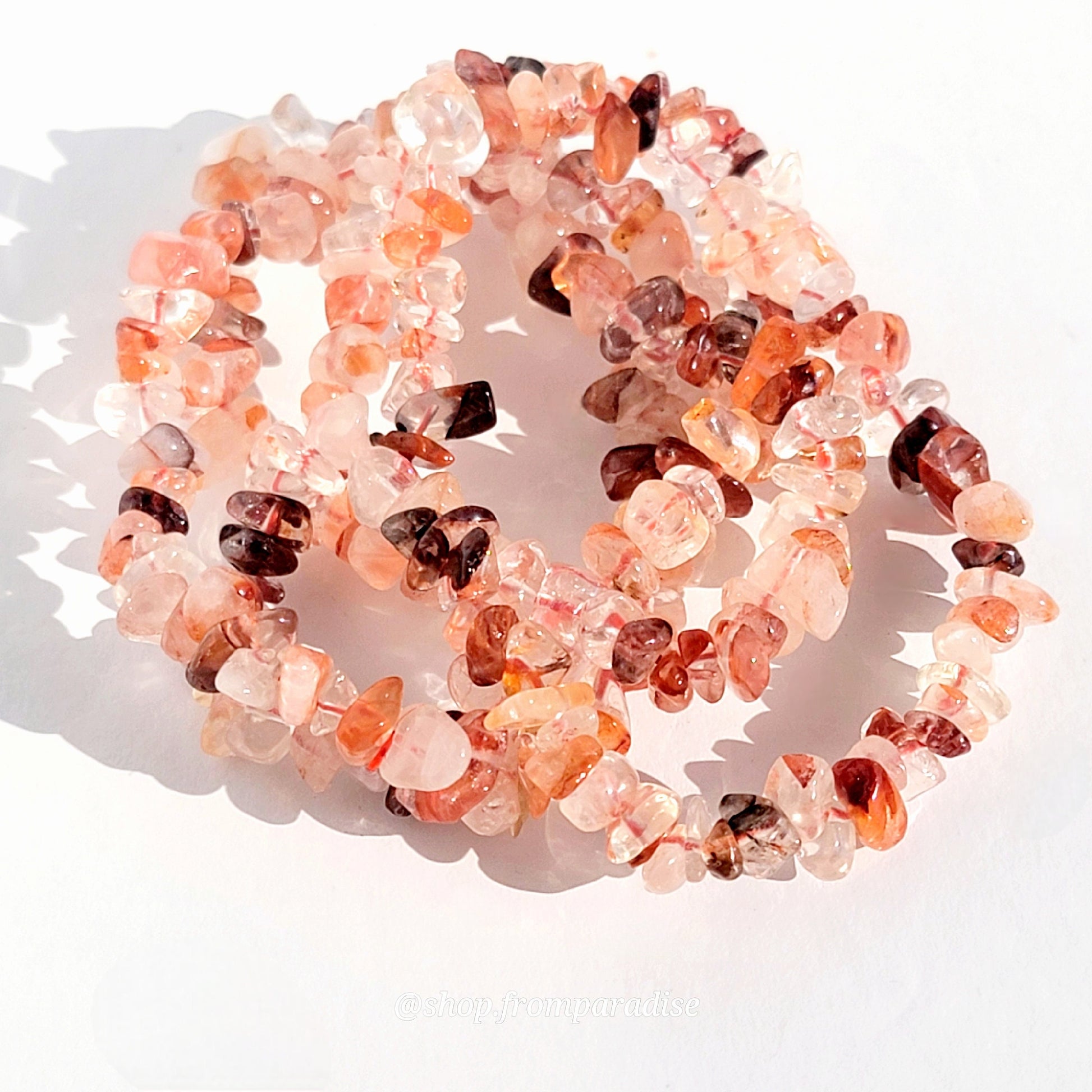 fire quartz crystal chip stretch bracelet jewelry displayed against a white background