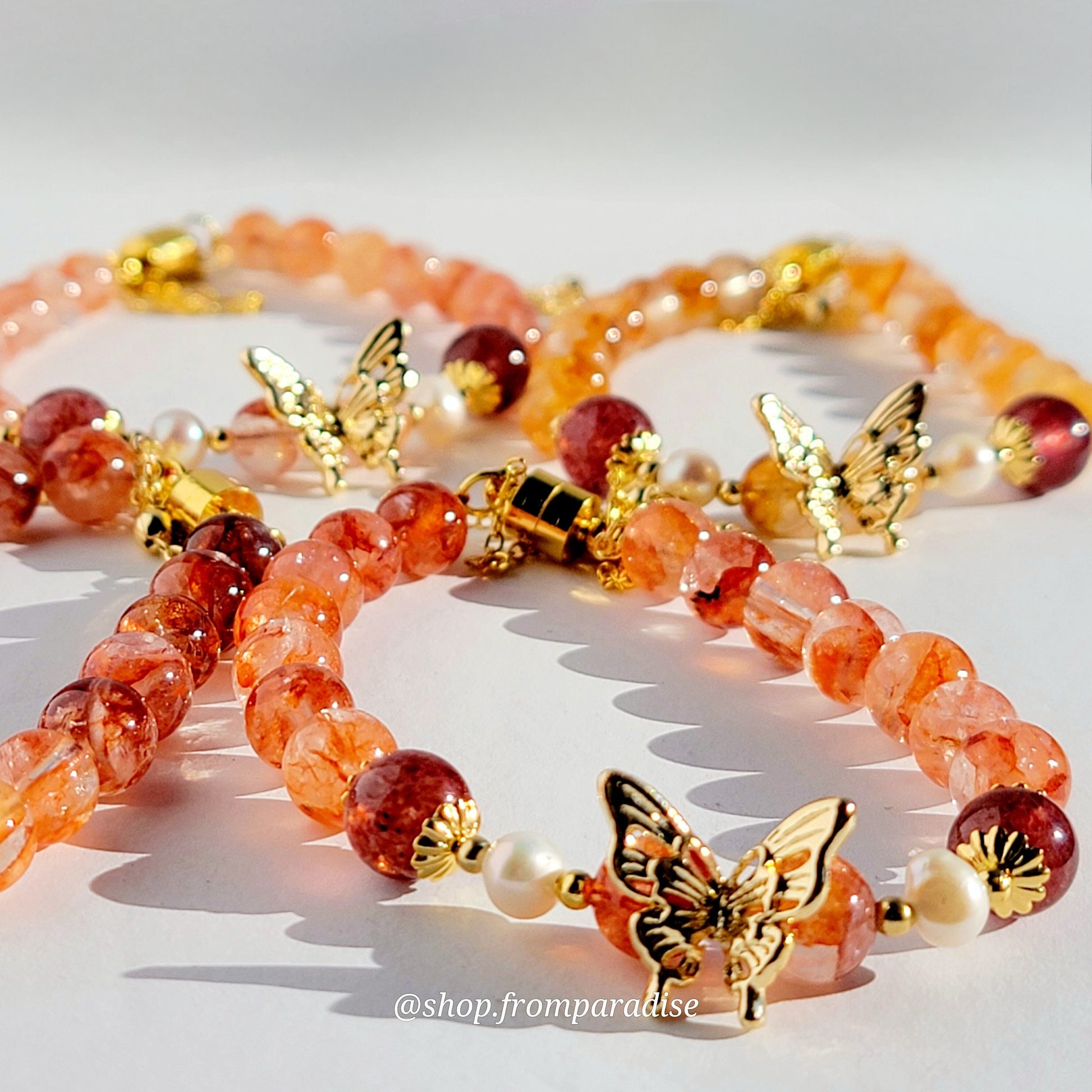 Fire Quartz and Strawberry Quartz Butterfly Charm Magnetic Crystal Bracelet