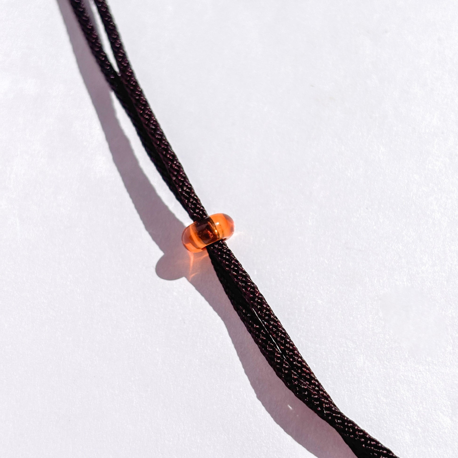 Laughing Buddha Peach Moonstone Sunstone Cord Necklace