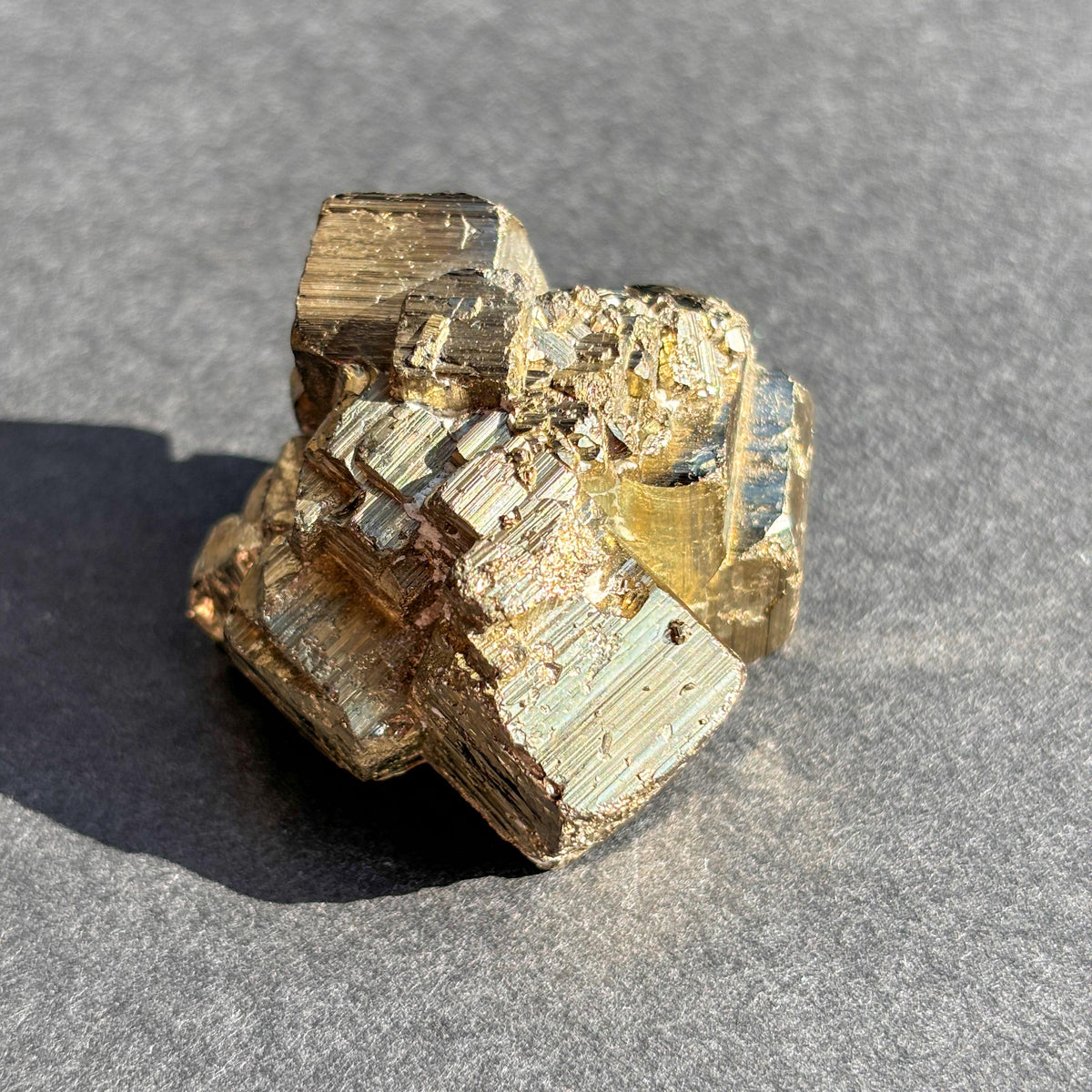 Pyrite Crystal Mineral Specimen against a black background