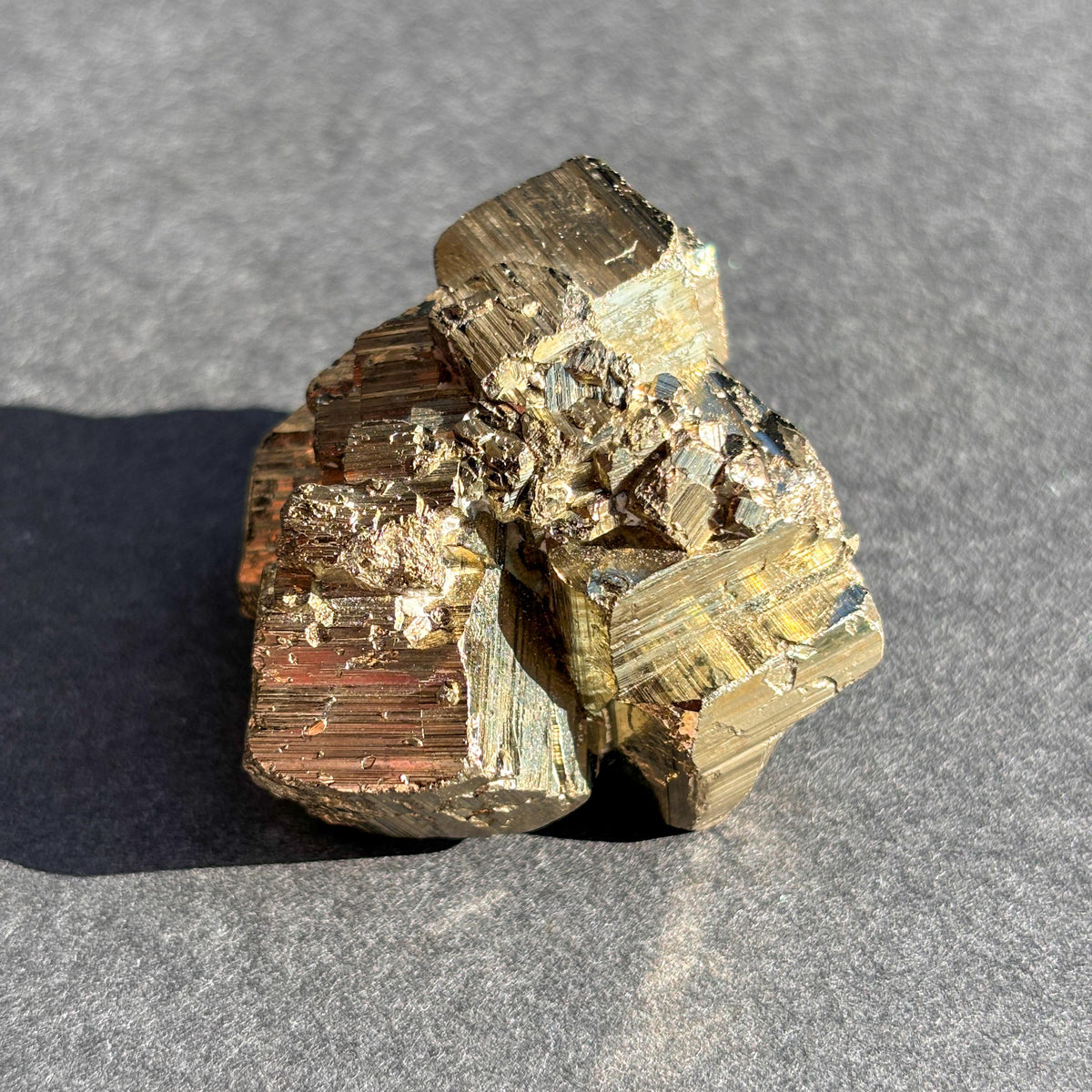 Pyrite Crystal Mineral Specimen against a black background