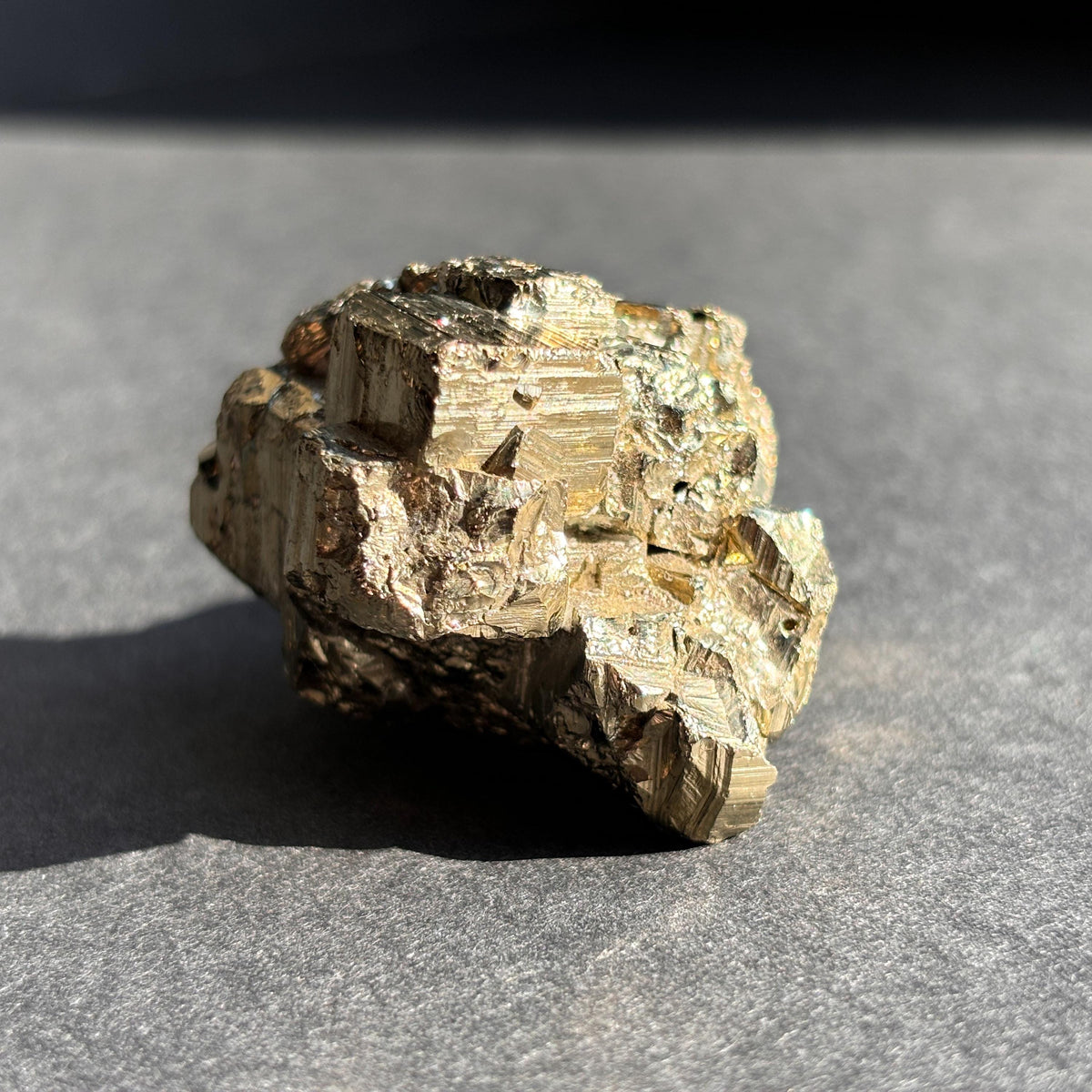 Pyrite Crystal Mineral Specimen against a black background