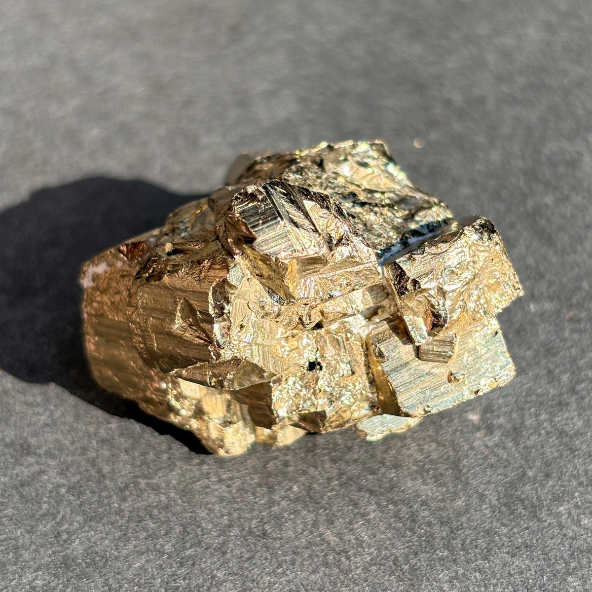 Pyrite Crystal Mineral Specimen against a black background