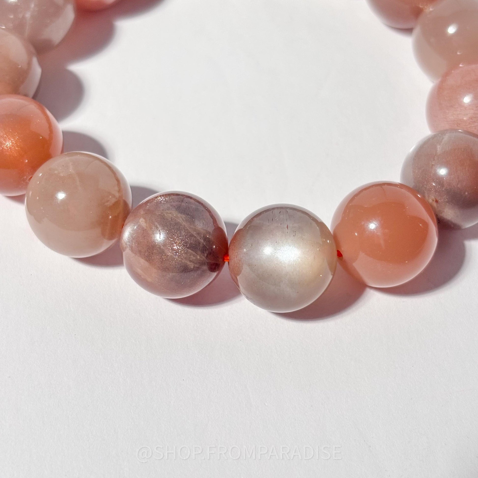 Peach and Black Moonstone Round Bead Crystal Bracelet