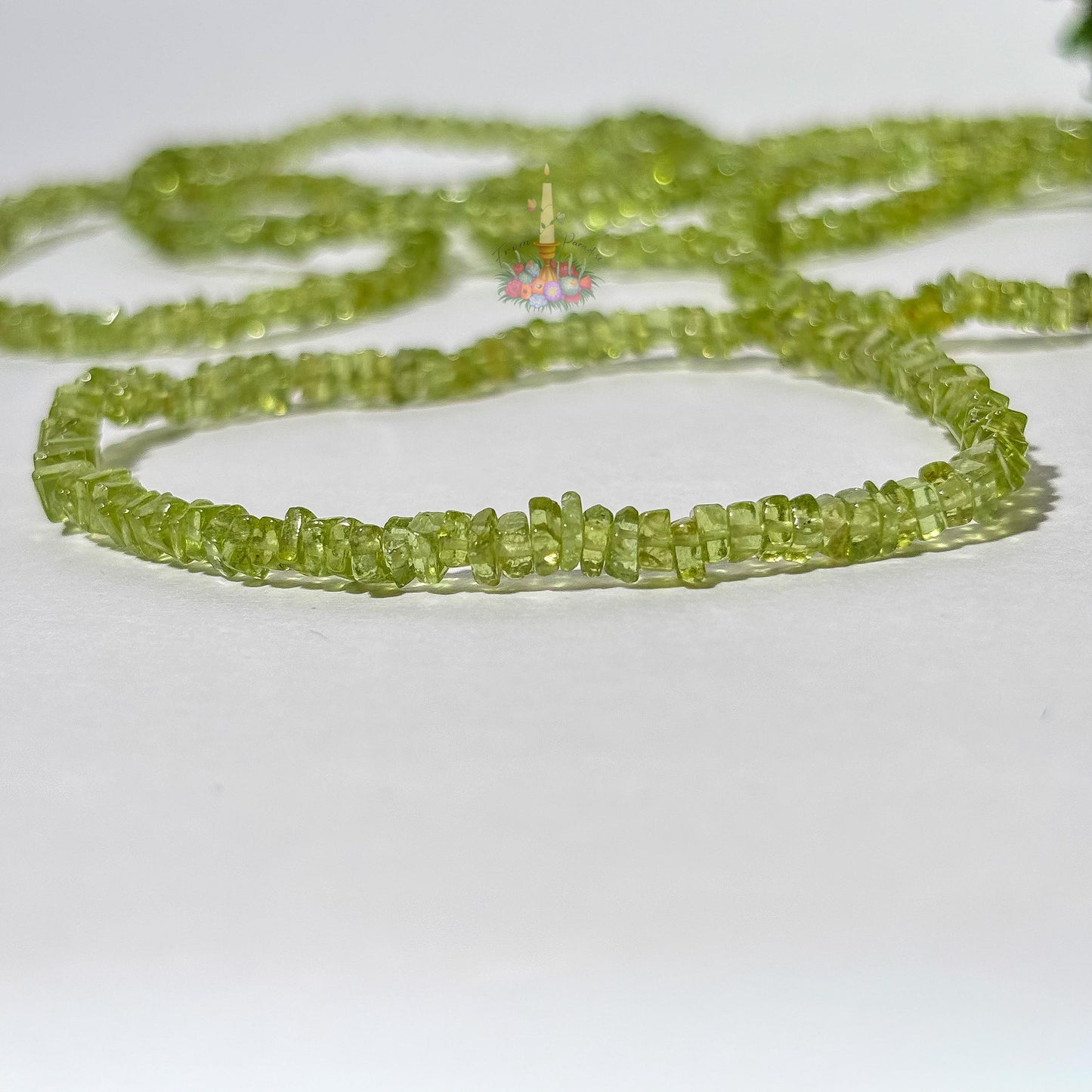 Peridot Crystal Bracelet: Stone for Abundance and Renewal