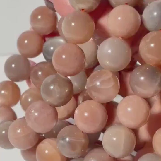 Peach and Black Moonstone Round Bead Crystal Bracelet