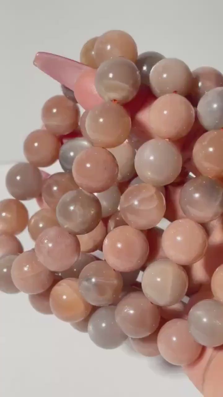 Peach and Black Moonstone Round Bead Crystal Bracelet
